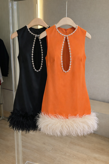 Beautiful customer in Orange embellished feather trim dress